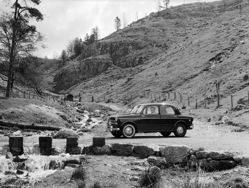 Geoff Charles road tests the Fiat 1100 (1451496)